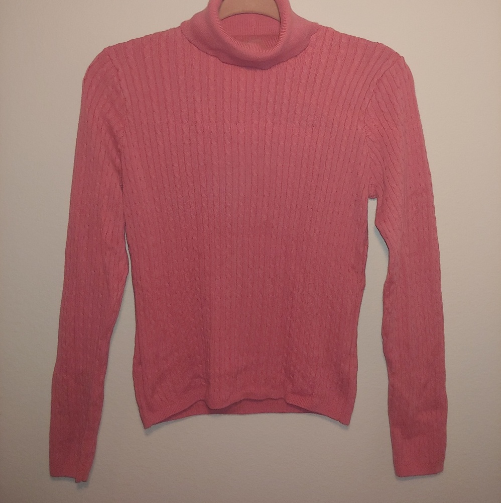 Pink knitted turtleneck sweater